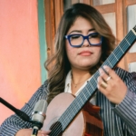 Woman holding guitar